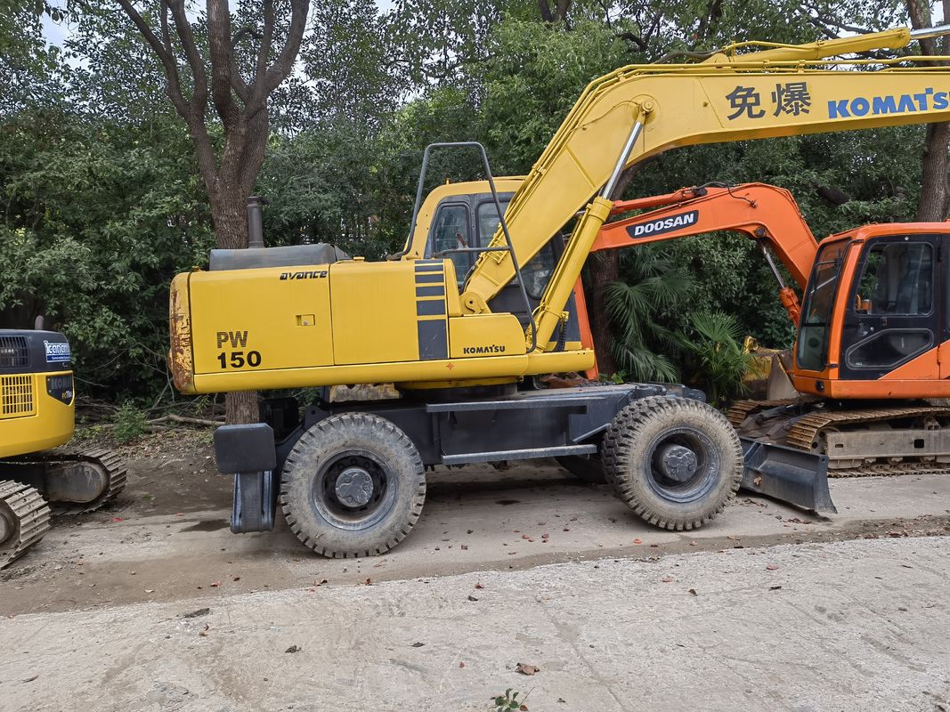 بیل مکانیکی چرخ‌دار Komatsu PC150W-6 دست دوم، بیل مکانیکی متحرک 15 تنی از چین